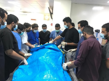 Residence of emergency medicine performing workshop training in tracheostomy